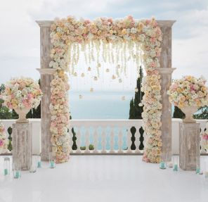 Creating a Majestic Entrance to Your Wedding Venue with Faux Flower Archways